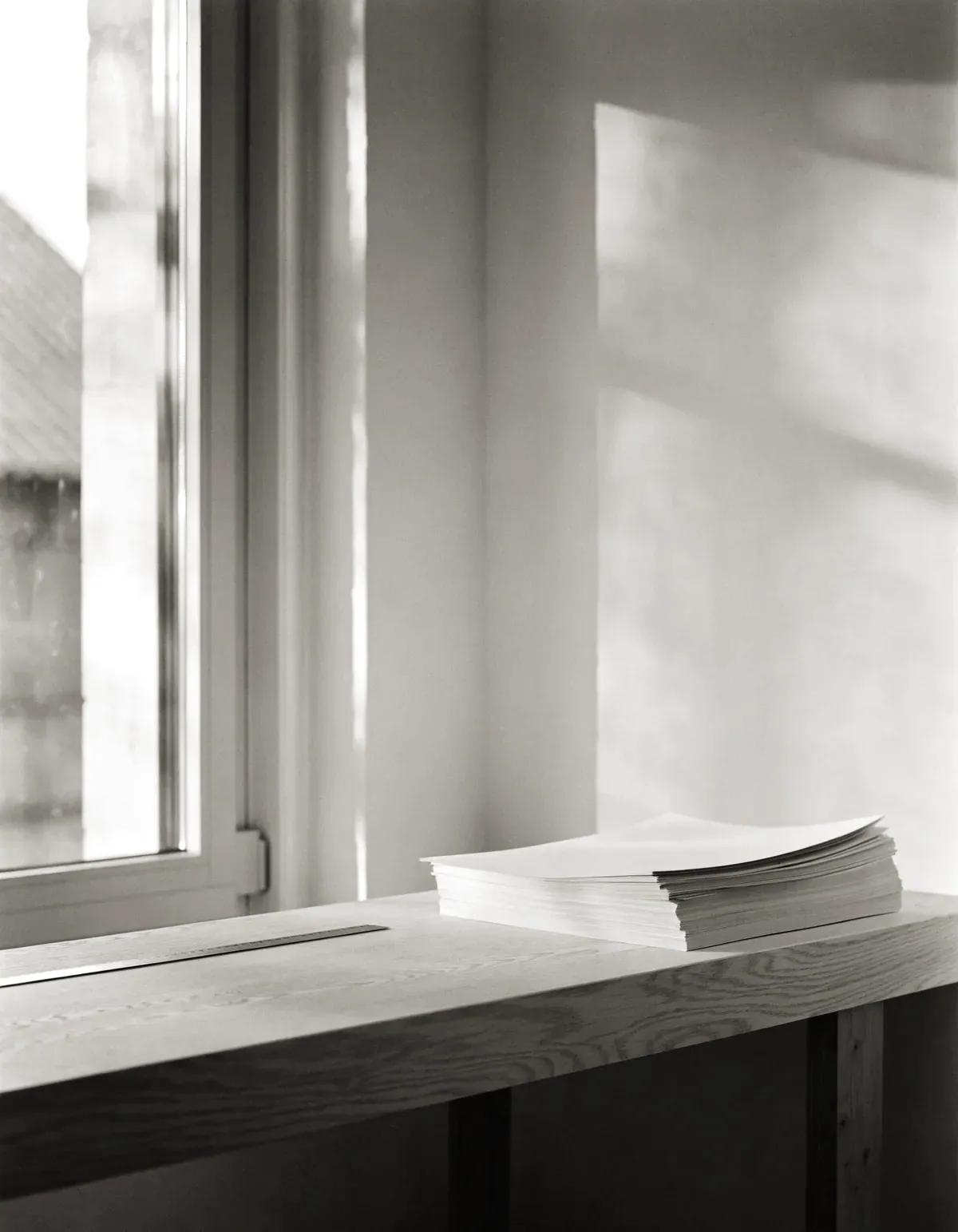 Daylight falling across a working surface in the studio.